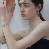 Gray Bow Pearl Earrings