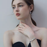 Gray Bow Pearl Earrings