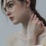 CH Mini Bow Pearl Earrings