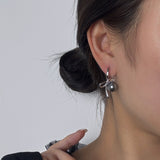 Gray Bow Pearl Earrings