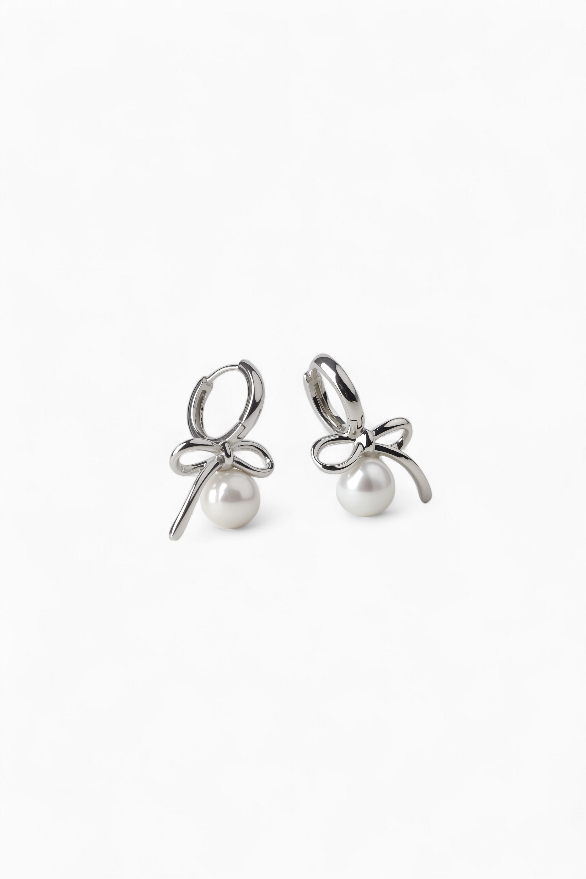 CH Bow Pearl Earrings