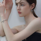 Gray Bow Pearl Earrings - Coddle Heaven